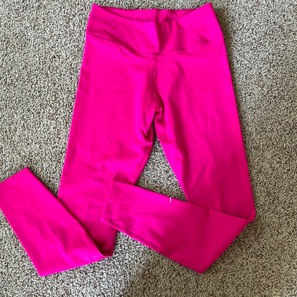 Bright pink Nike leggings